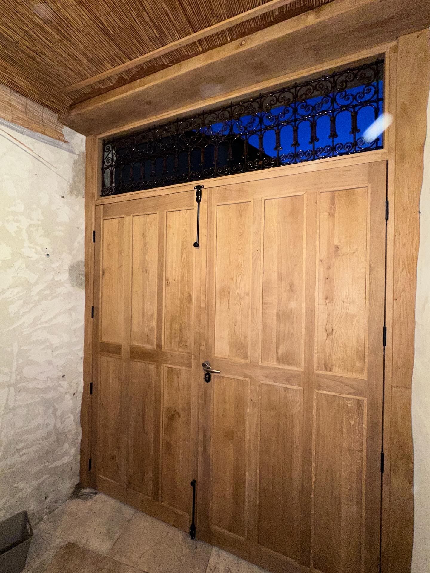 Porte de grange en chêne massif sur mesure